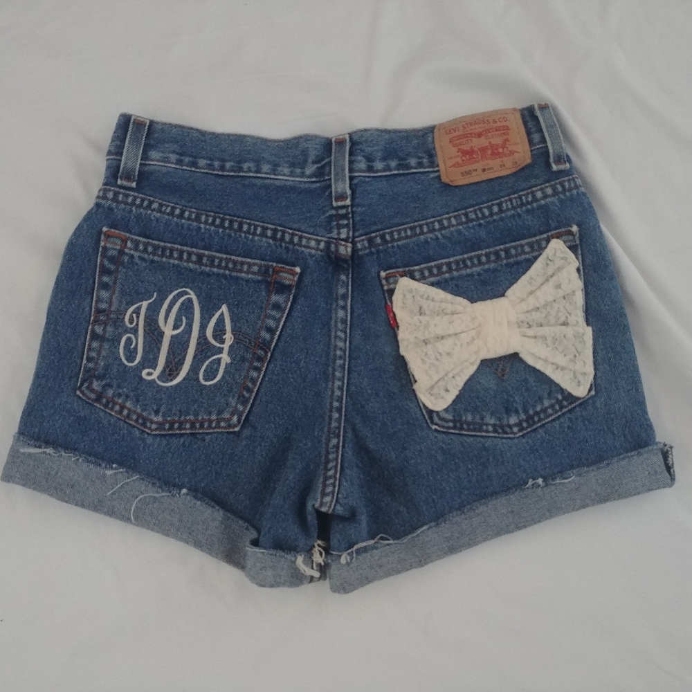 Vintage 550 Levis Cut Off Denim Shorts w/ lace bow, embroidered "TDJ" modern 4?
